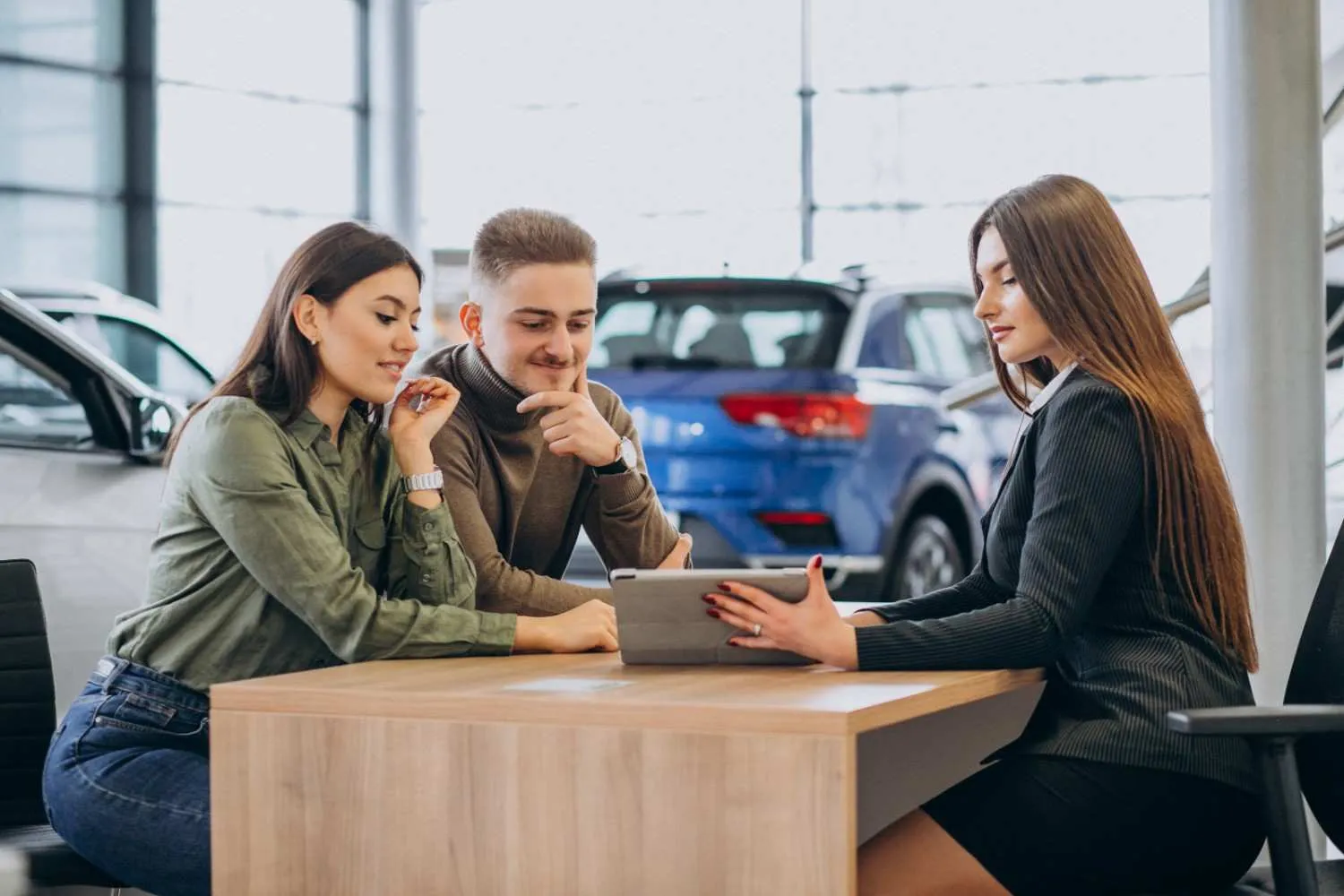 Auto insurance advisor reviewing options on a tablet